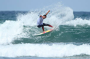 AJ Matthews surfing