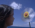 Girl with toy windmill. 