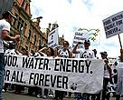 WWF supporters join a protest march at the UNFCCC climate talks in Durban South Africa calling for food, water and energy for all.